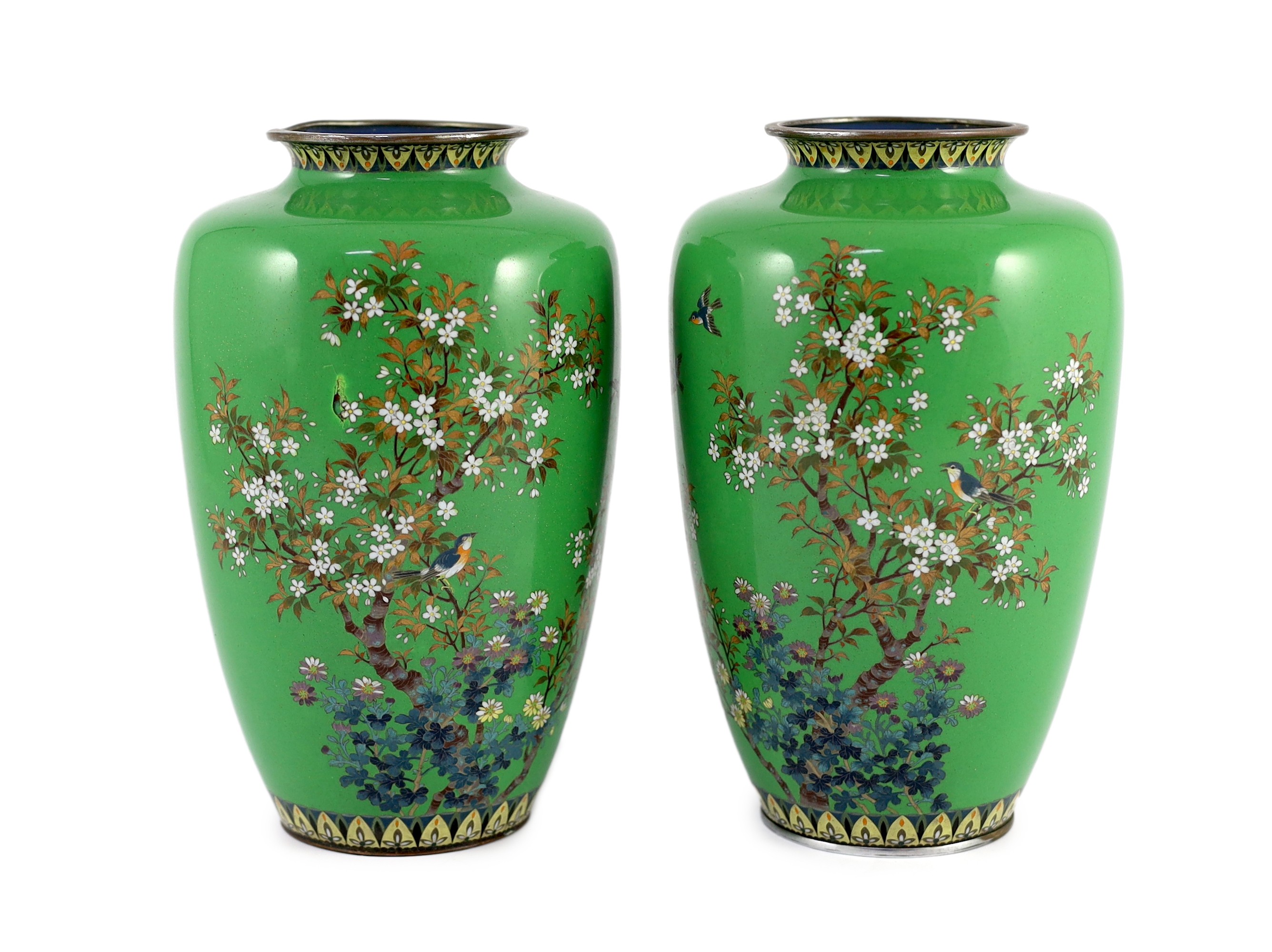 A pair of Japanese cloisonné enamel vases, early 20th century, 21.3cm high, one damaged